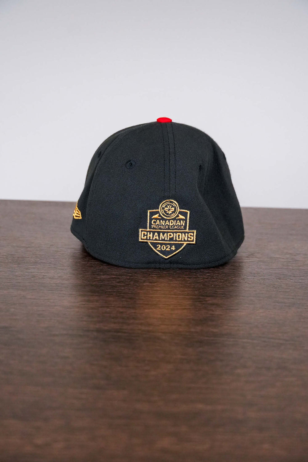 #C2 - Champion Black Hat w/"CAVS" in Gold & Red