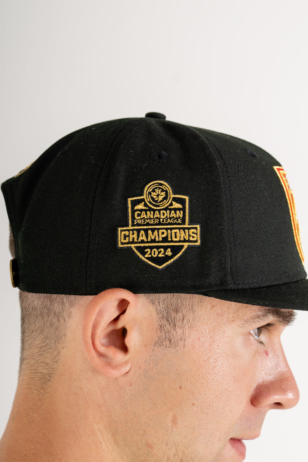 #C6 Champion Black hat w/red crest & gold embroidery